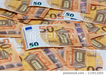 Pile of 50 euro notes business background. 3 113911005
