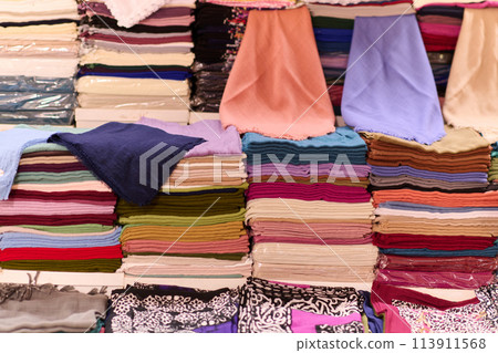 A Tapestry of Tradition: Colorful Array of Muslim Clothing for Sale on Istanbul Streets A Tapestry of Tradition: Colorful Array of Muslim Clothing for Sale on Istanbul Streets 113911568