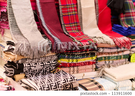 A Tapestry of Tradition: Colorful Array of Muslim Clothing for Sale on Istanbul Streets A Tapestry of Tradition: Colorful Array of Muslim Clothing for Sale on Istanbul Streets 113911600