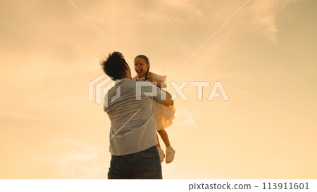 father throws child kid daughter into sky, silhouette happy family, children dream flying airplane pilot, child and dad play, kid air toss, joyful child, playful moments, daddy's girl flying, child up 113911601
