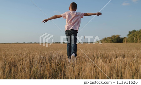 boy child running across field playing airplane flight dream, creative child play, escape game outdoor, child's dream fligh, kid fun running, imaginative child play, field freedom boy, dream game run boy child running across field playing airplane flight dream, creative child play, escape game outdoor, child's dream fligh, kid fun running, imaginative child play, field freedom boy, dream game run 113911620