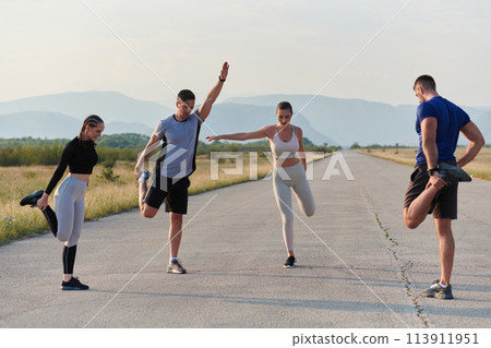 Diverse Group of Athletes Prepare Together for a Run 113911951
