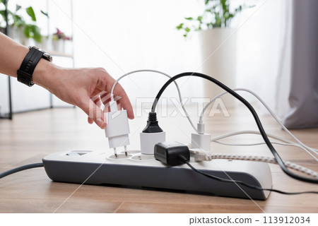 Power strip socket with connected plugs. Power strip socket with connected plugs. 113912034