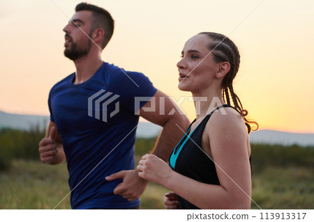 Dynamic Duo: Fitness-Ready Couple Embraces Confidence and Preparation for Upcoming Marathons Dynamic Duo: Fitness-Ready Couple Embraces Confidence and Preparation for Upcoming Marathons 113913317