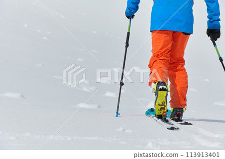 Close-Up of Ski Gear Ready for a Challenging Ascent 113913401