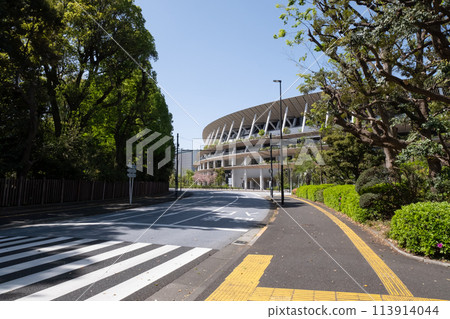 Road next to the National Stadium and fresh greenery Road next to the National Stadium and fresh greenery 113914044