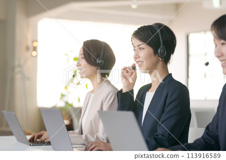 Female call center operators 113916589