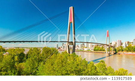 Bridge over river in Surrey to New Westminster. Sunny Day. Bridge over river in Surrey to New Westminster. Sunny Day. 113917589