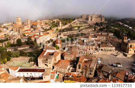 Aerial view of Trujillo overlooking central square, castle and Church of Santa Maria la Mayor 113917733
