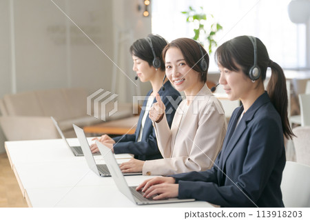 Female call center operators Female call center operators 113918203