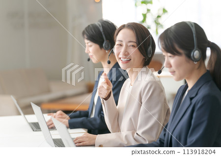 Female call center operators Female call center operators 113918204