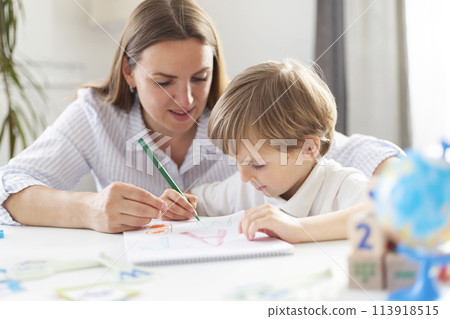 Mother Teaching Child Drawing at Home Mother Teaching Child Drawing at Home 113918515