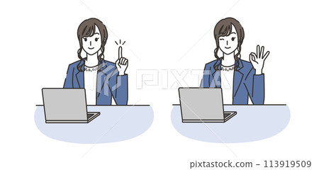 A woman in office casual clothes pointing at a computer and making an OK pose 113919509