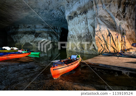 Kayaks lined up at an abandoned underground silica mine that is flooded with water at Crystal City, Missouri. Kayaks lined up at an abandoned underground silica mine that is flooded with water at Crystal City, Missouri. 113919524