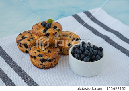 Homemade baked blueberry muffins with fresh blackberries. Tasty pastry sweet cupcake dessert. Berry pie cupcakes with organic berries. Gluten free healthcare recipe from alternative flour Homemade baked blueberry muffins with fresh blackberries. Tasty pastry sweet cupcake dessert. Berry pie cupcakes with organic berries. Gluten free healthcare recipe from alternative flour 113922162