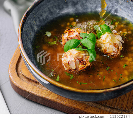 almond meatball soup on top view almond meatball soup on top view 113922184