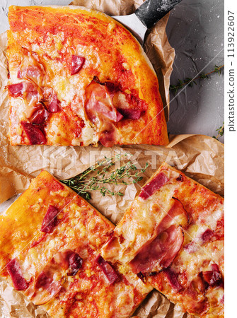 Fresh baking homemade pizza napolitana with prosciutto 113922607