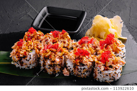 sushi rolls with salmon pieces and red caviar sushi rolls with salmon pieces and red caviar 113922610