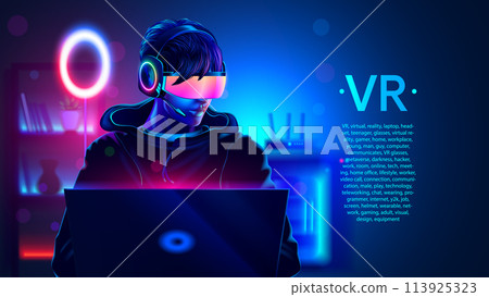 Teenager gamer with virtual reality headset in room with laptop on home workplace in darkness. Young man or guy wearing virtual reality or VR glasses communicates in the metaverse in virtual reality. Teenager gamer with virtual reality headset in room with laptop on home workplace in darkness. Young man or guy wearing virtual reality or VR glasses communicates in the metaverse in virtual reality. 113925323