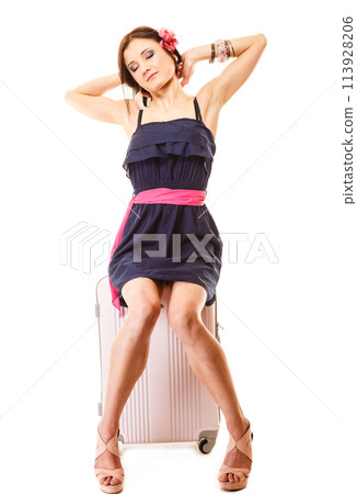 Travel and vacation. Woman with suitcase luggage bag. 113928206