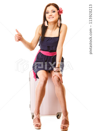 Travel and vacation. Woman with suitcase luggage bag. 113928213
