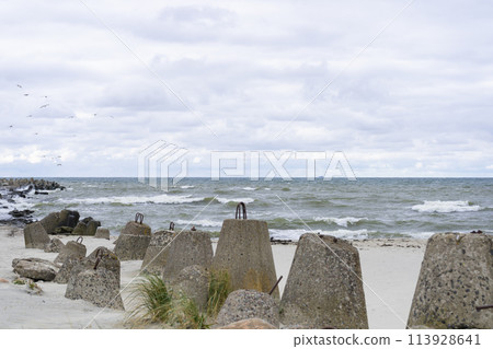 Storm on Baltic Sea. Breakwaters. Tetrapods. Baltiysk Storm on Baltic Sea. Breakwaters. Tetrapods. Baltiysk 113928641