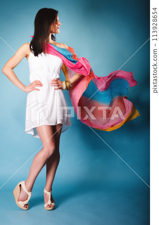 summer woman with colored shawl on blue 113928654