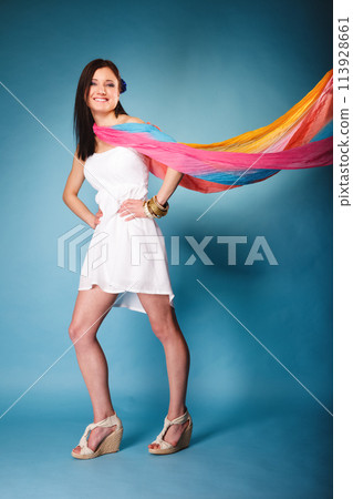 summer woman with colored shawl on blue 113928661