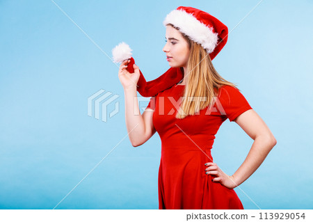 Happy woman wearing Santa Claus helper costume Happy woman wearing Santa Claus helper costume 113929054
