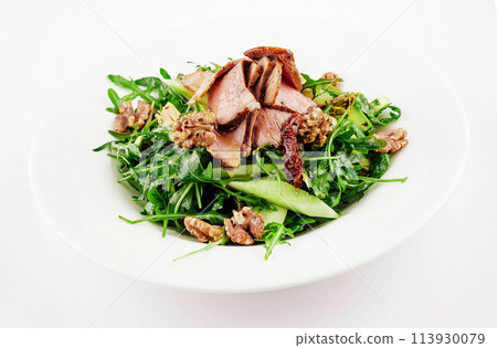 Warm salad of veal, arugula, cucumber with walnut Warm salad of veal, arugula, cucumber with walnut 113930079