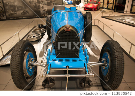 Foreign cars on display in the showroom 113930842