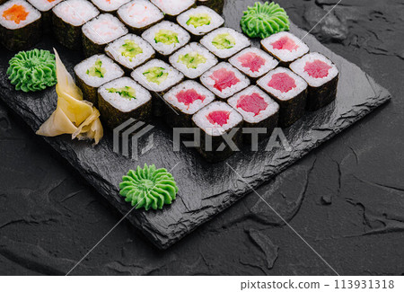 Maki sushi set served on black stone tray Maki sushi set served on black stone tray 113931318