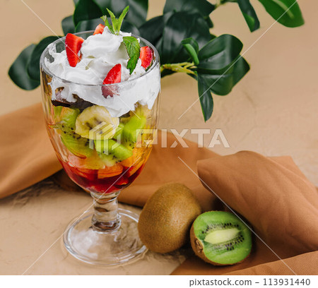 Serving of fresh rainbow fruit salad 113931440