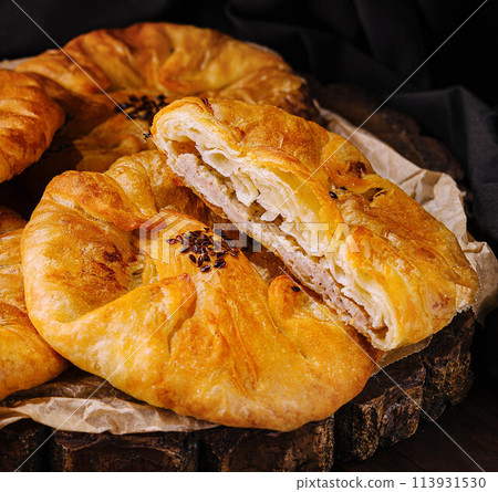 Cooking traditional pies with minced meat close up Cooking traditional pies with minced meat close up 113931530