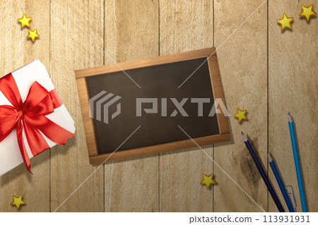 Gift box and empty small chalkboard Gift box and empty small chalkboard 113931931