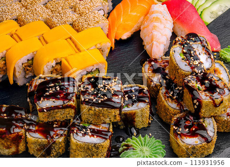 Large Assortment of Various Sushi Rolls Large Assortment of Various Sushi Rolls 113931956