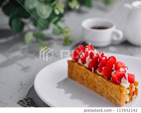 Piece of Napoleon Cake with Strawberry on plate Piece of Napoleon Cake with Strawberry on plate 113932142