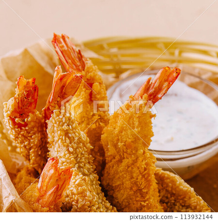 Tempura Shrimps in wood basket on the table Tempura Shrimps in wood basket on the table 113932144