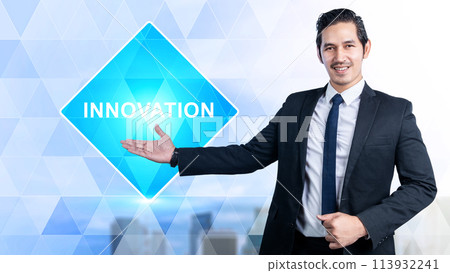 Young Indonesian handsome with business outfit standing and presenting new idea with confident. Young Indonesian handsome with business outfit standing and presenting new idea with confident. 113932241