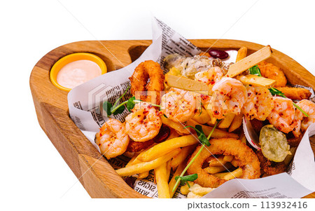 fried seafood plate on wooden tray 113932416