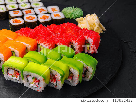 Sushi set on black stone background 113932432
