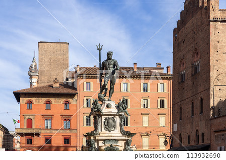 Bologna Neptune Fountain set against historic buildings 113932690