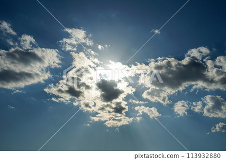 The sun hiding in the clouds The sun hiding in the clouds 113932880