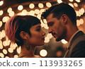 A couple shares an intimate moment, closely facing each other. The warm lights create a romantic and tender atmosphere. 113933265