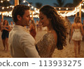 A couple dances closely at a festive beach party. Intimacy and celebration by the sea. 113933275