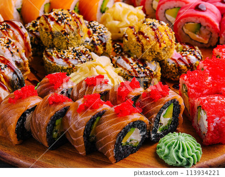 Delicious variety of sushi freshly prepared 113934221
