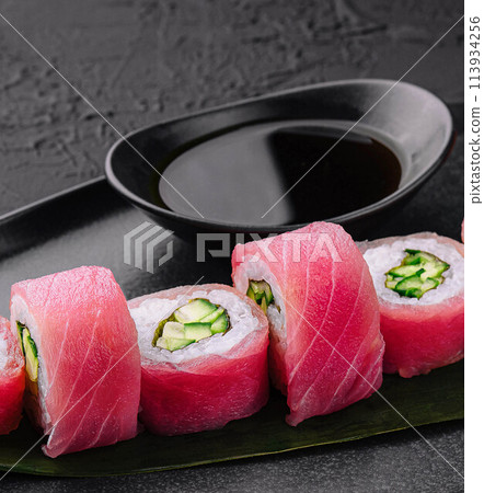Japanese uramaki tuna roll with cucumber Japanese uramaki tuna roll with cucumber 113934256