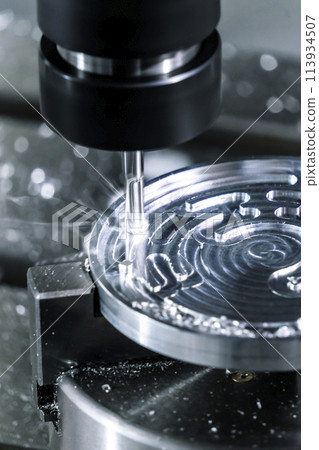 Lathe milling metal in industry. Process of machining a metal part Lathe milling metal in industry. Process of machining a metal part 113934507
