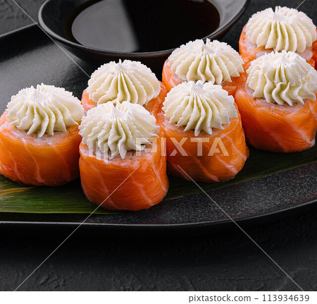Philadelphia Sushi with Philadelphia Cheese on Black Asian Plate 113934639
