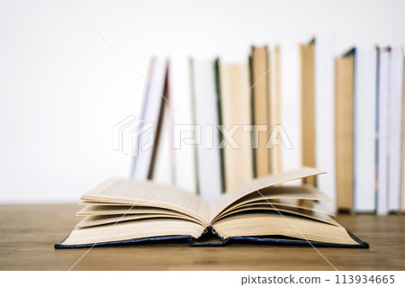 Books on desk in a school or university classroom. Education, study concept background 113934665